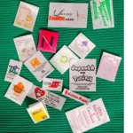 A green table with many different labels on it