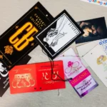 A table with several different cards and tags.